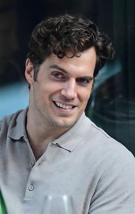 henry cavil smile|henry cavill fist reload gif.